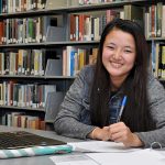 Library - girl with laptop