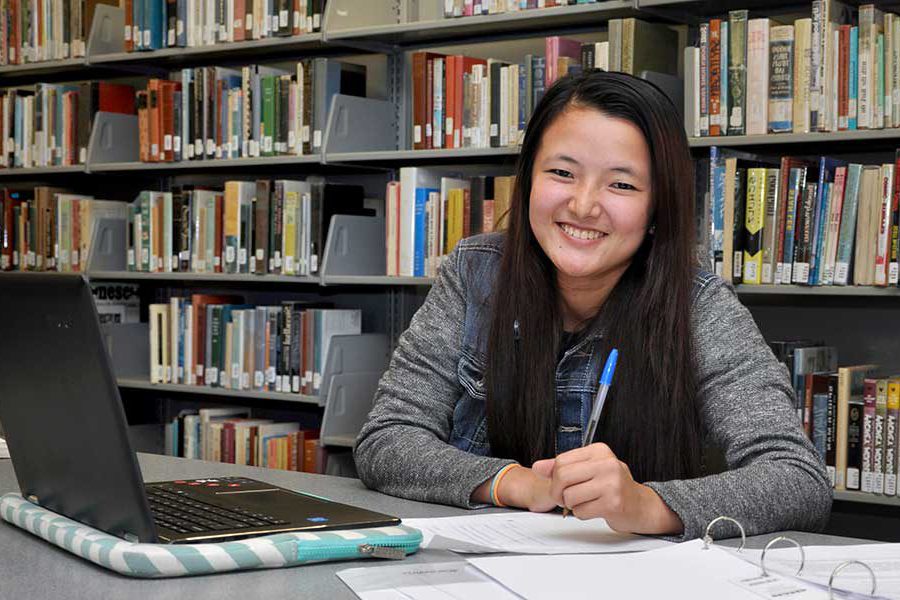 Library - girl with laptop