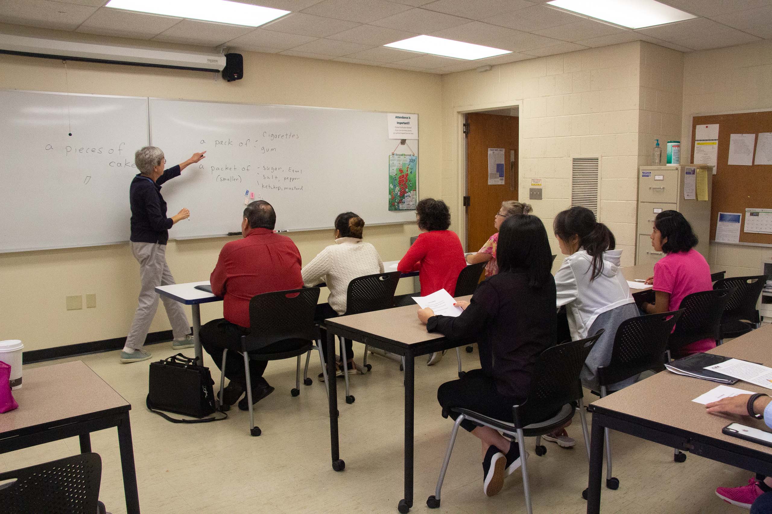 Photo of students listening to a lecture.