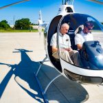 Instructor and student in helicopter pilot training.