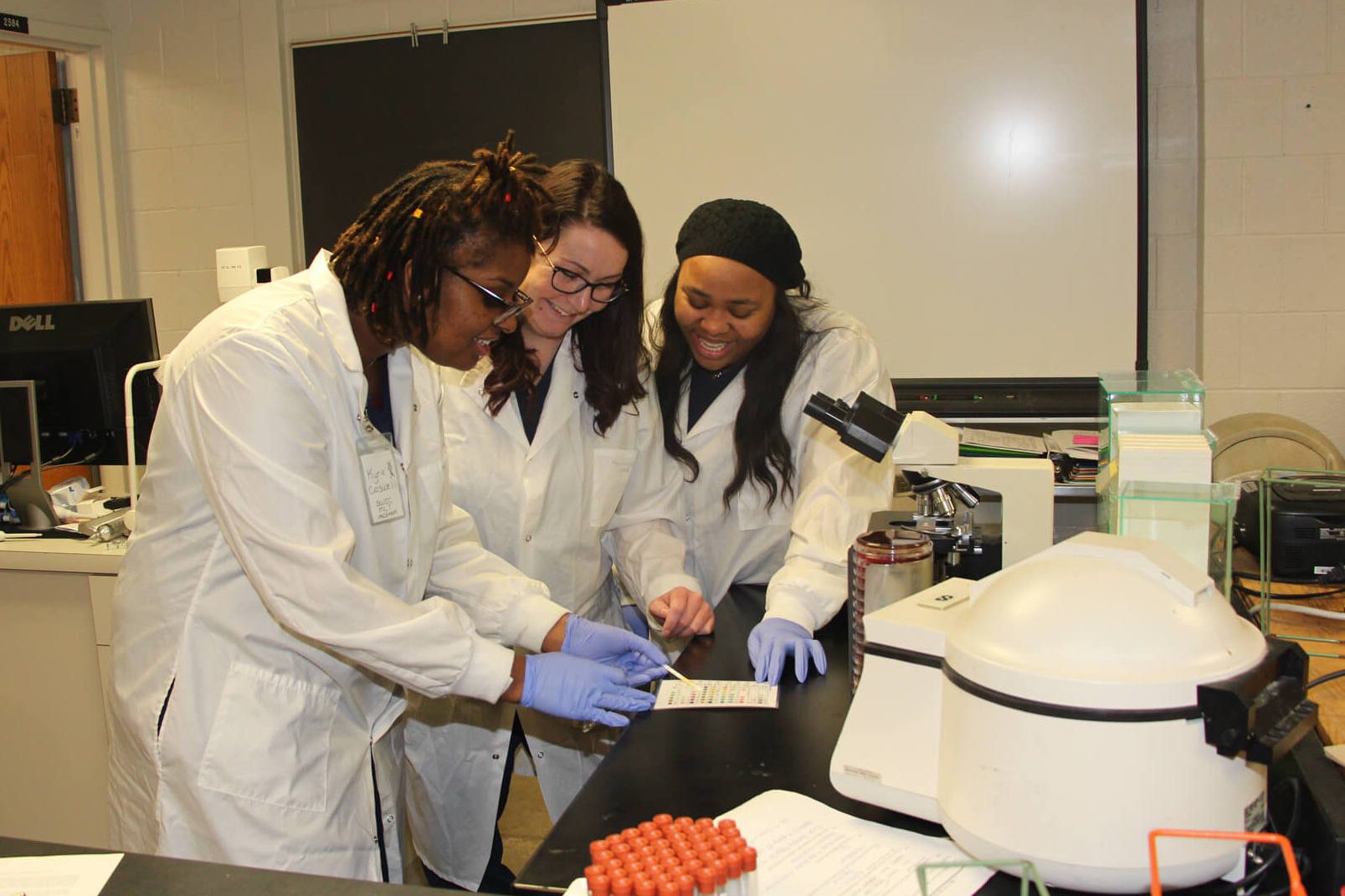 Southwestern Illinois College medical lab technician students work on a practical lab exercise.