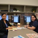 Enrollment services staff member and student