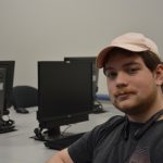 Cybersecurity and Networking Student in classroom